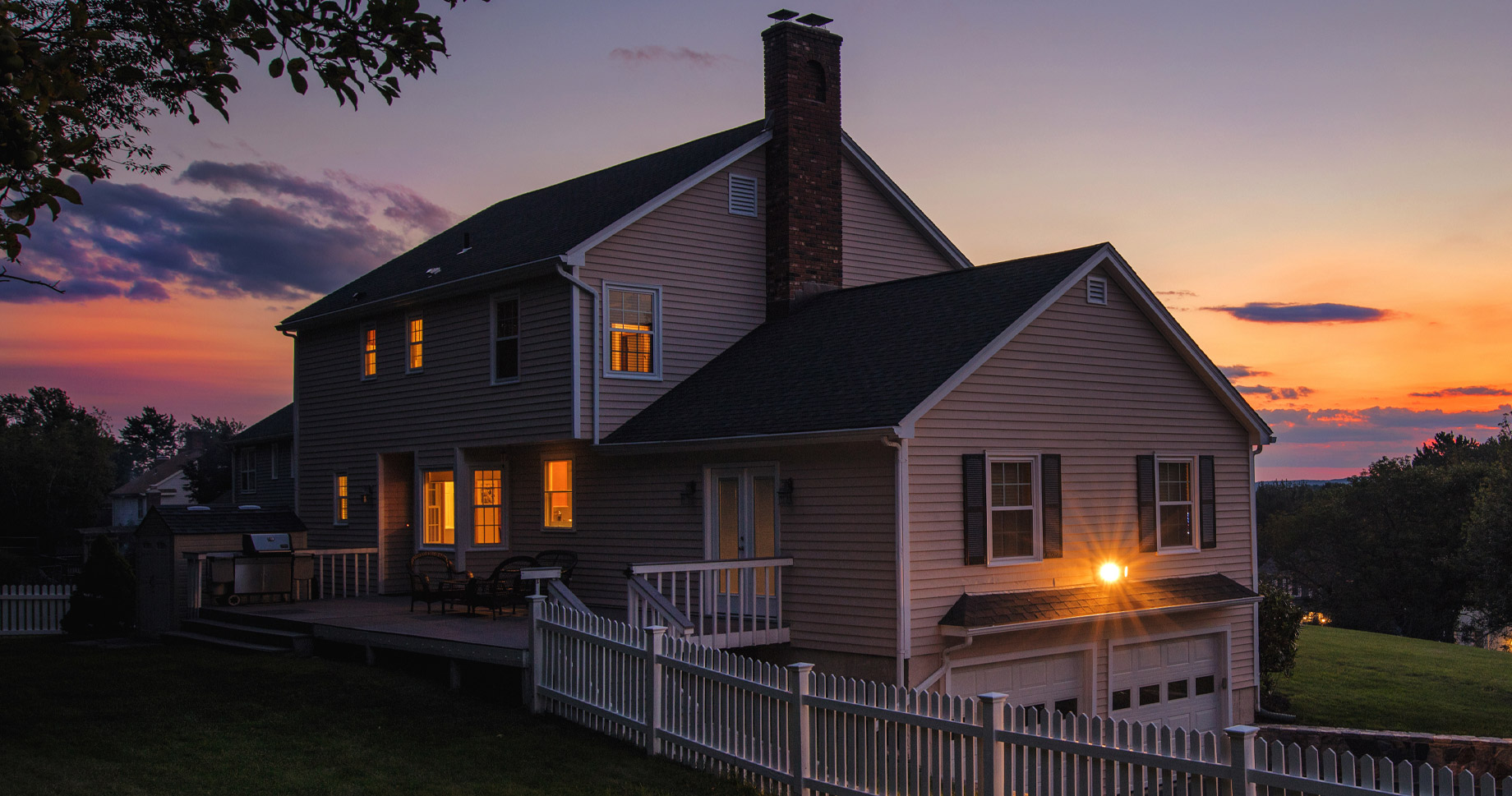 Maine residential home at dusk